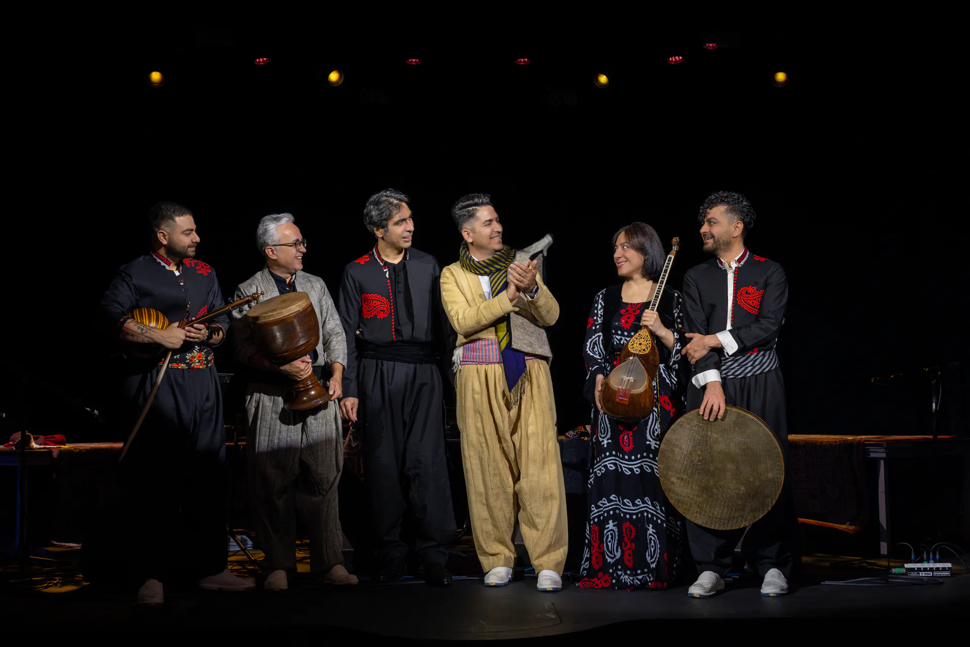 Hawraman Music Group performing together on stage.