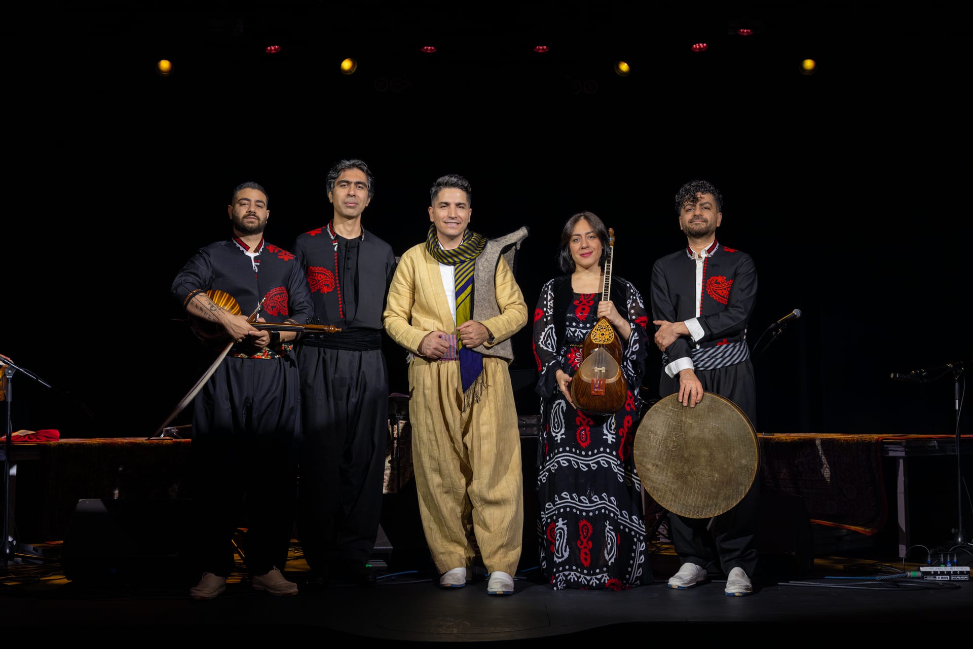 Hawraman Music Group performing together on stage