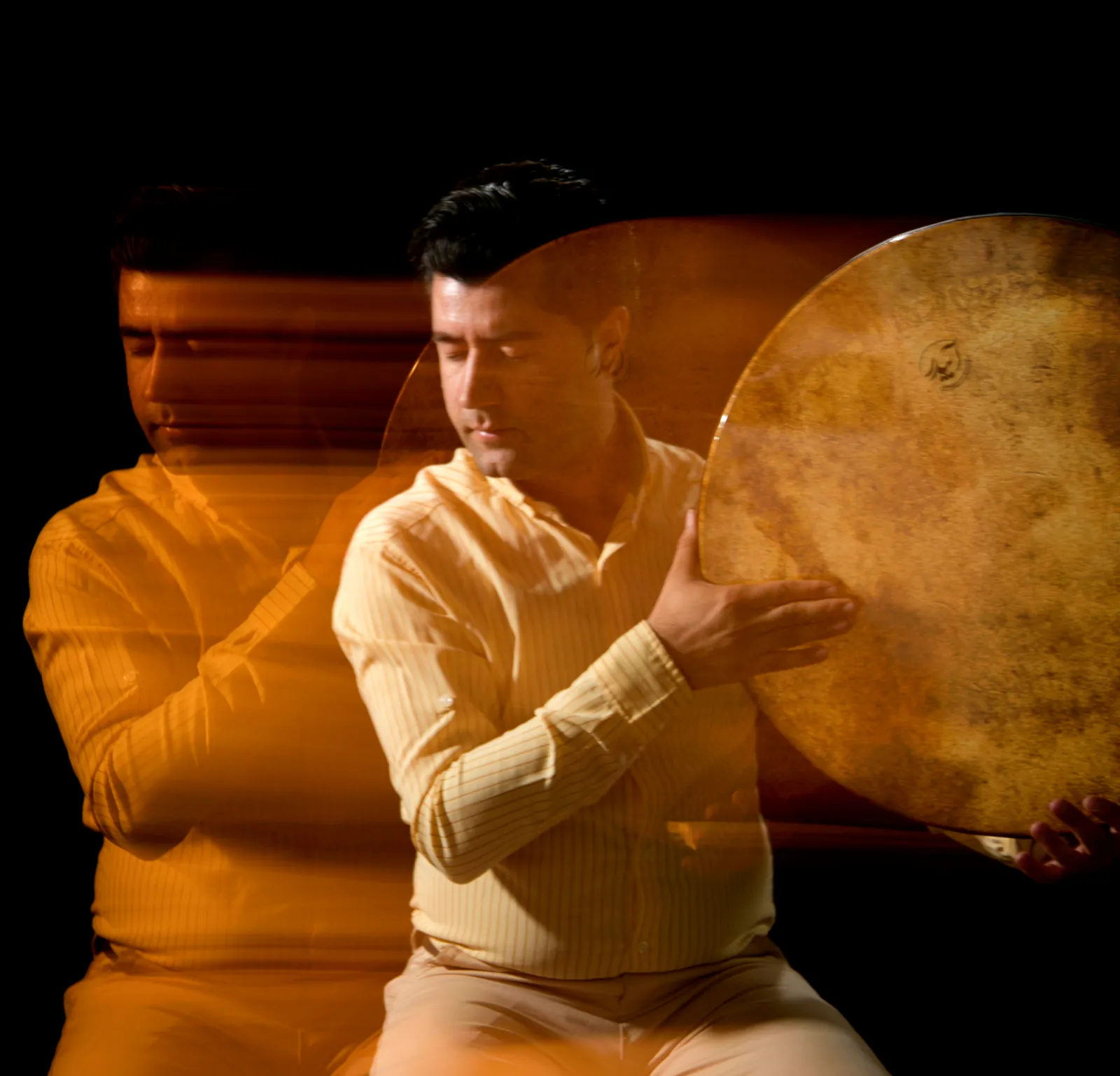 Farid Zandi performing a Daf in a motion study.